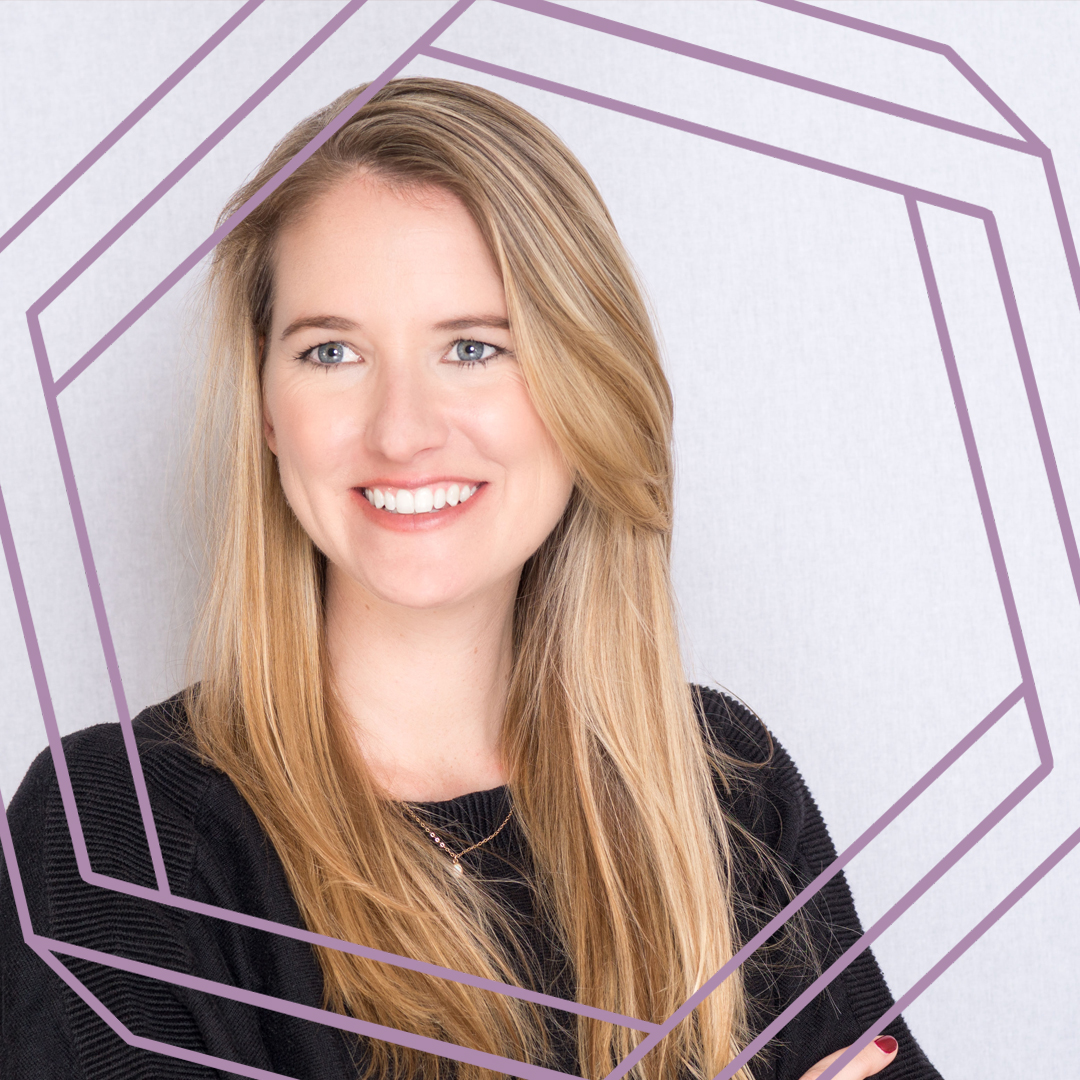 Liz, a white woman with long blonde hair, smiles and looks slightly off camera. There is a stylized purple hexagon framing the photo.