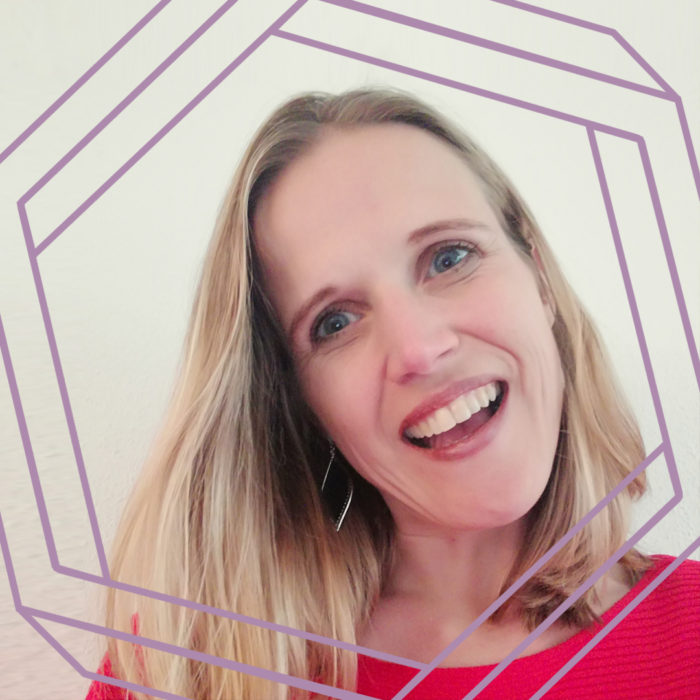 Yvon, a woman with long blond hair, smiles at the camera. There is a stylized purple octagon superimposed around her face.